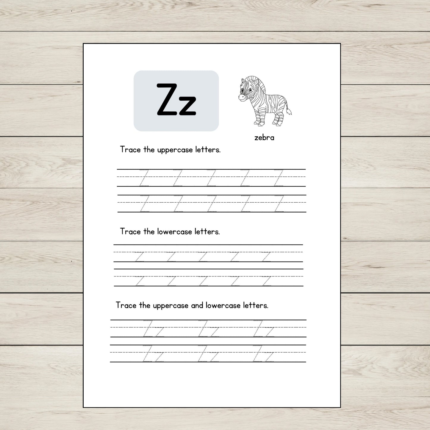 Worksheet for tracing uppercase and lowercase 'Z' letters with a zebra illustration.