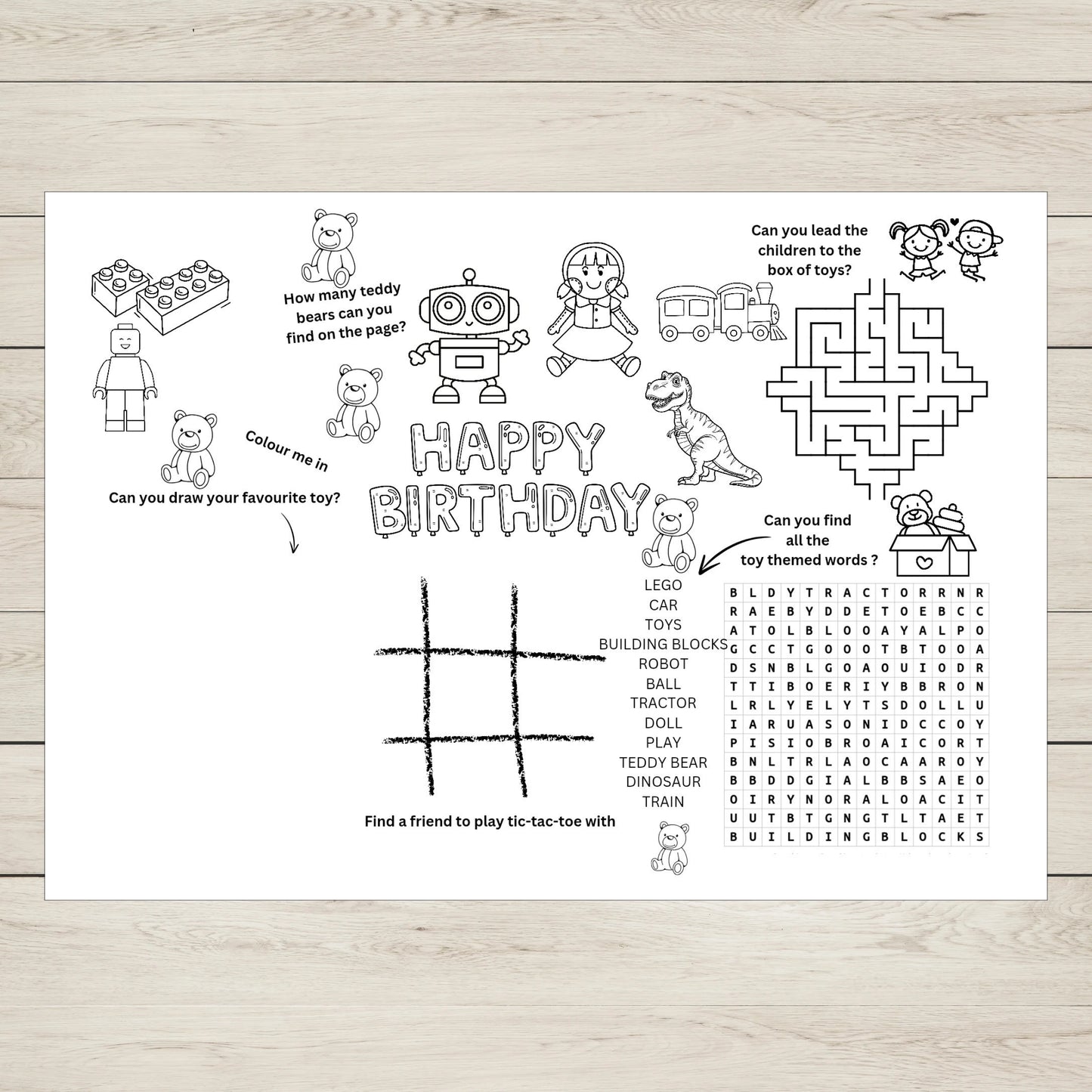 Children's birthday activity sheet with various games and colouring prompts on a wooden surface.