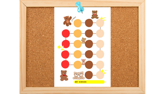 A cork board with a teddy bear themed reward chart on it.