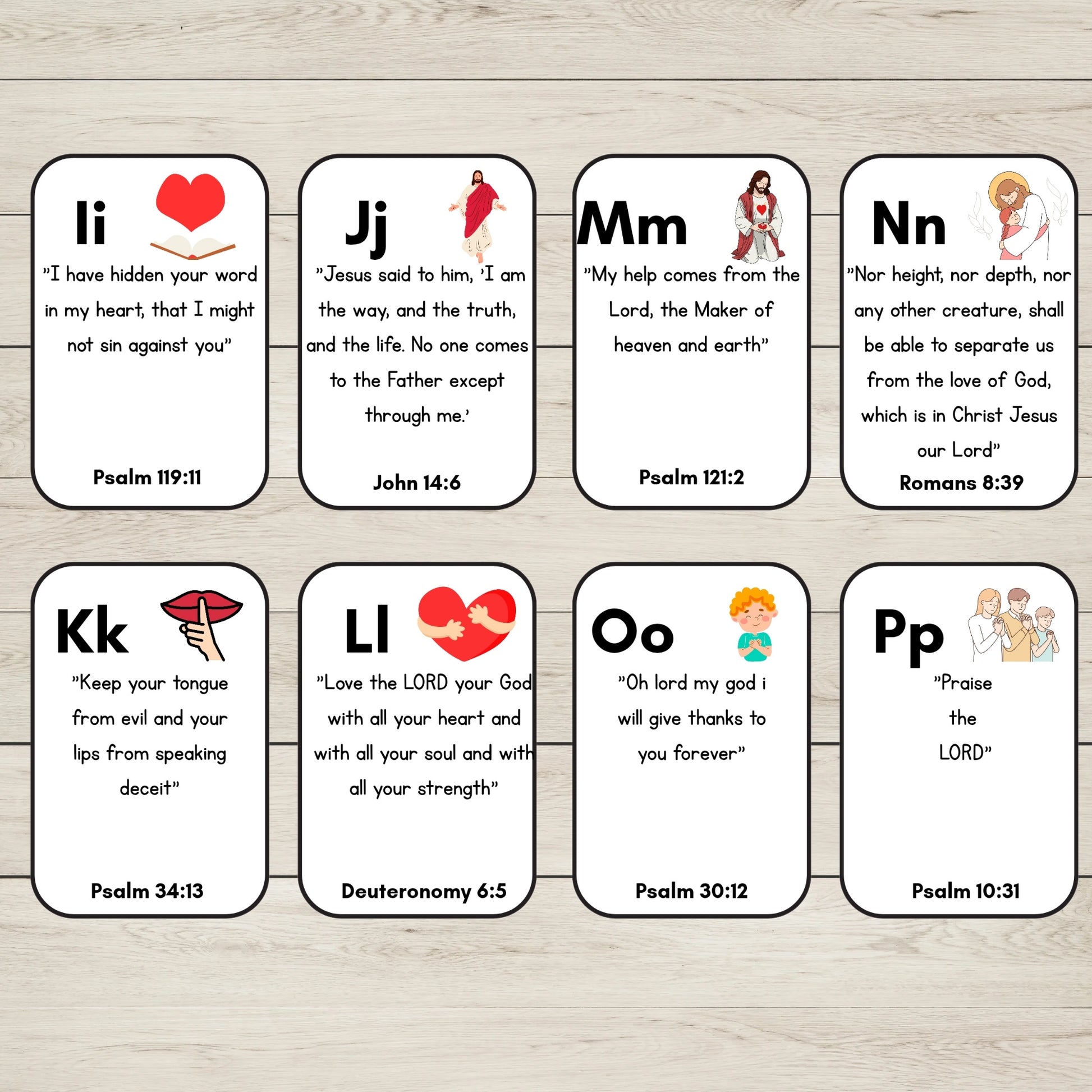 Eight small white Bible verse cards I to P, arranged in two rows on a light wood surface. Each card has a rounded rectangle shape, a black border, a letter at the top, a scripture quote, a small illustration, and the verse reference at the bottom.