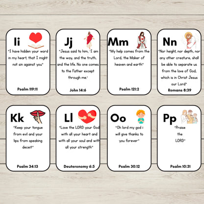 Eight small white Bible verse cards I to P, arranged in two rows on a light wood surface. Each card has a rounded rectangle shape, a black border, a letter at the top, a scripture quote, a small illustration, and the verse reference at the bottom.