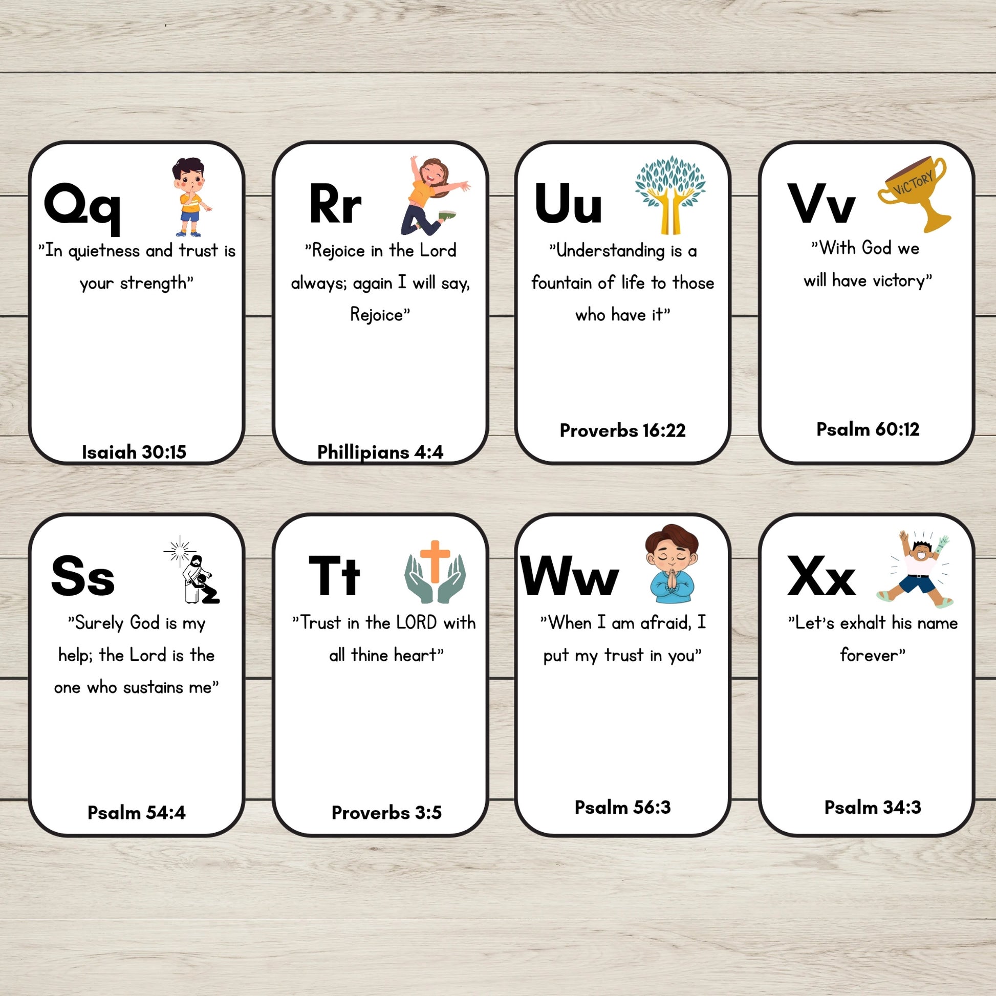 Eight Alphabet Bible Verse Cards, arranged in two rows on a light wood background. The cards feature uppercase letters from Q to X, biblical scripture quotes, and small cartoon illustrations.