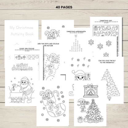 Collection of Christmas-themed activity sheets on a wooden surface