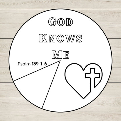 A circular black-and-white wheel craft for kids featuring God Knows Me. 