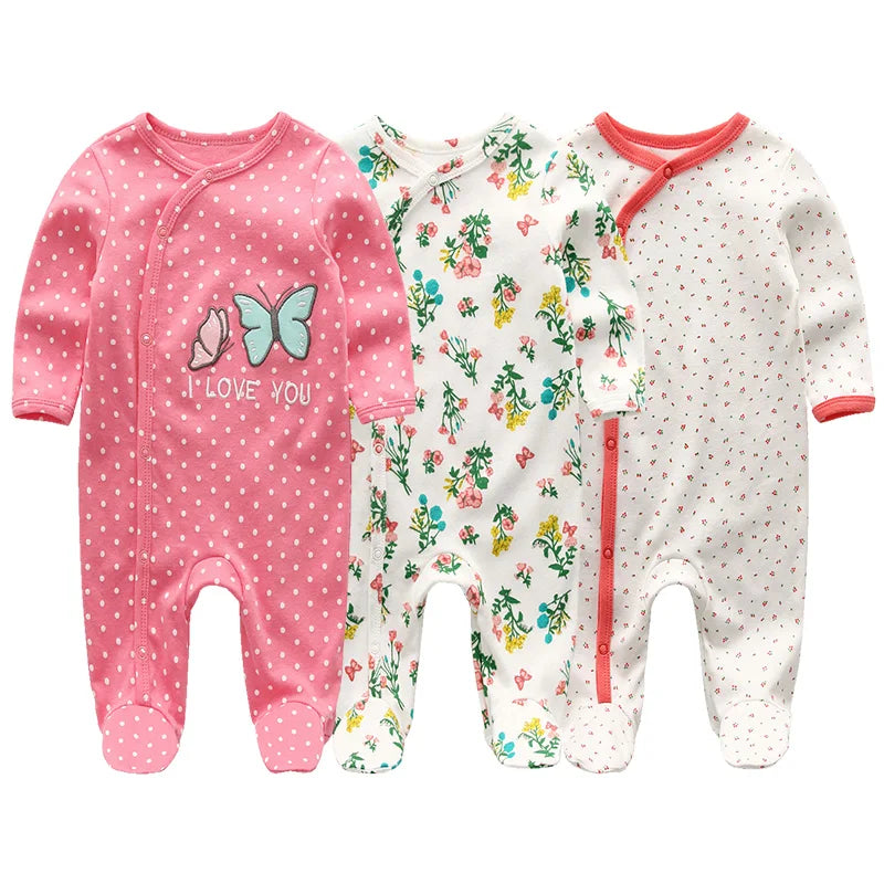 "A pack of 3 baby unisex organic cotton pink and white bodysuits with owl flower prints." 