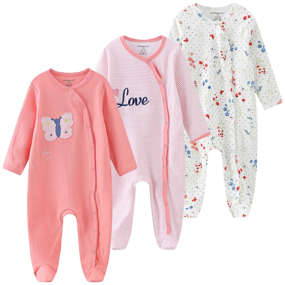 "A pack of 3 baby unisex organic cotton pink love bodysuits."