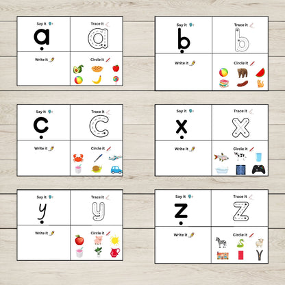 Educational posters with alphabet letters, say it, trace it, write it, and circle it exercises on a wooden surface.