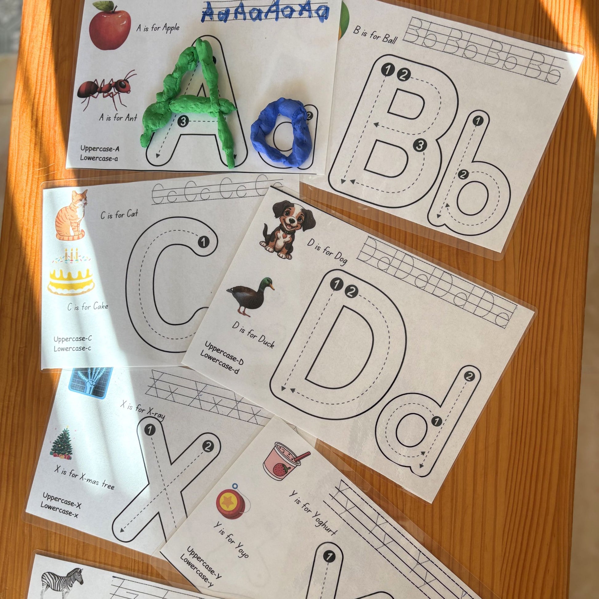 Printed out A-Z Playdough Mats for early literacy.