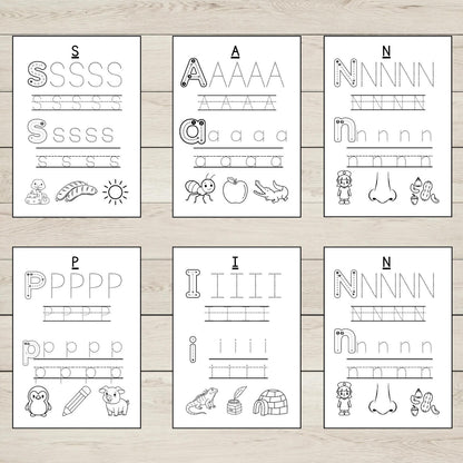 Set of six SATPIN tracing pages on a wooden surface