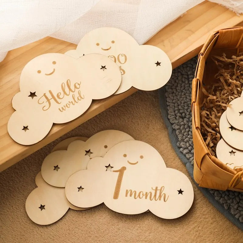 "Baby wooden cloud shape milestones cards."