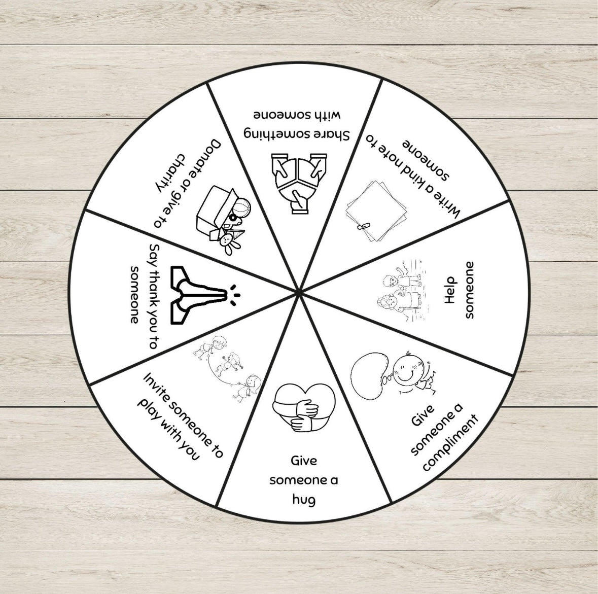 Wheel chart with kindness tasks for kids on a wooden background.