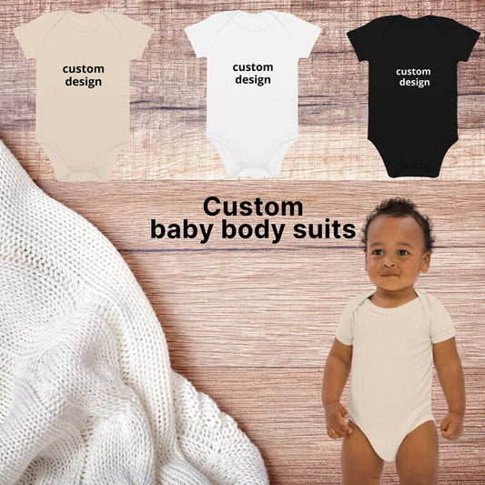 "A set of 3 baby bodysuits in black, neutral and white for you to customise."