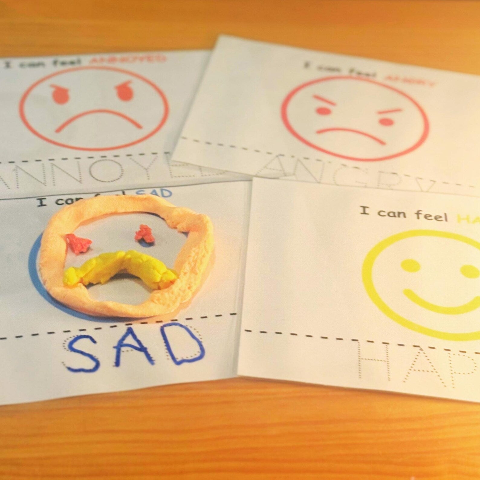 Emotions play dough cards for early learning. 