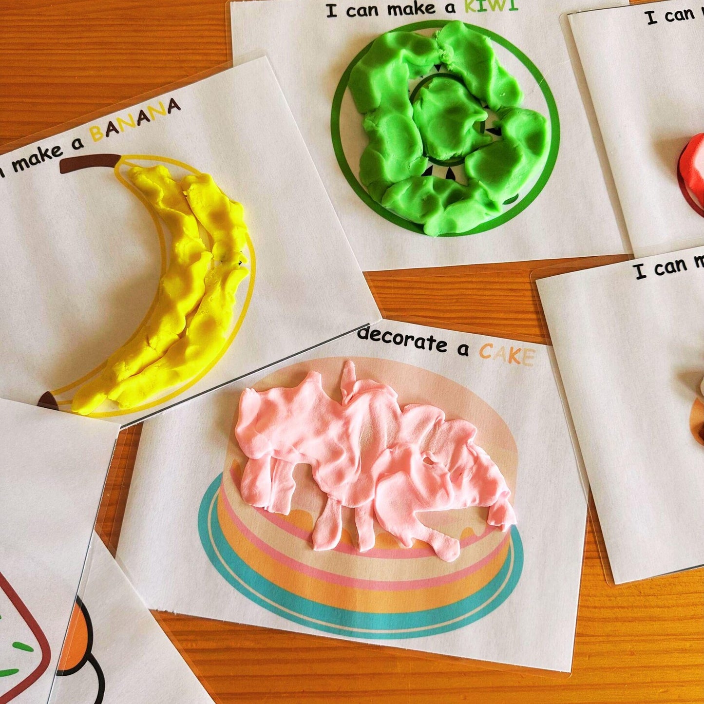 Printed food-themed play dough mats.