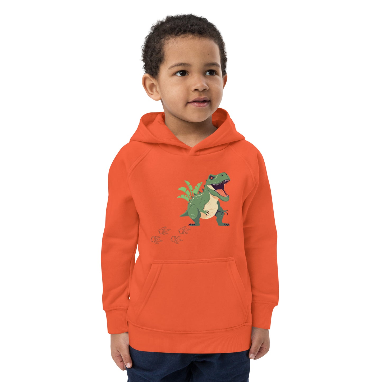 "A young boy wearing an orange dinosaur hoodie."