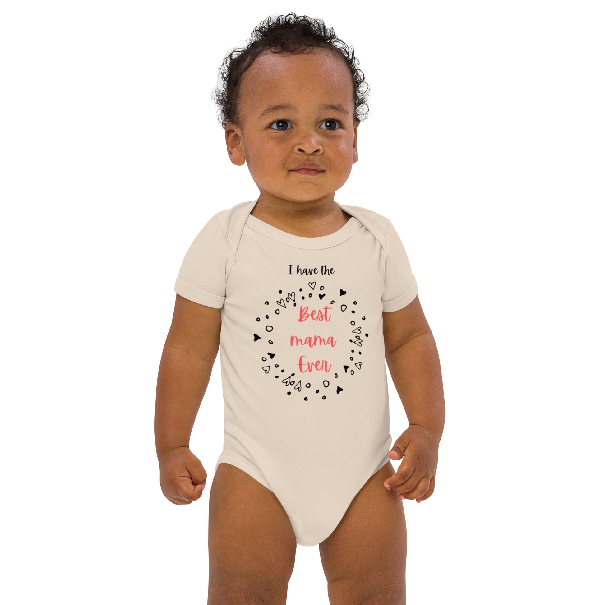 "A toddler boy wearing a best mma ever print neutral colour bodysuit."