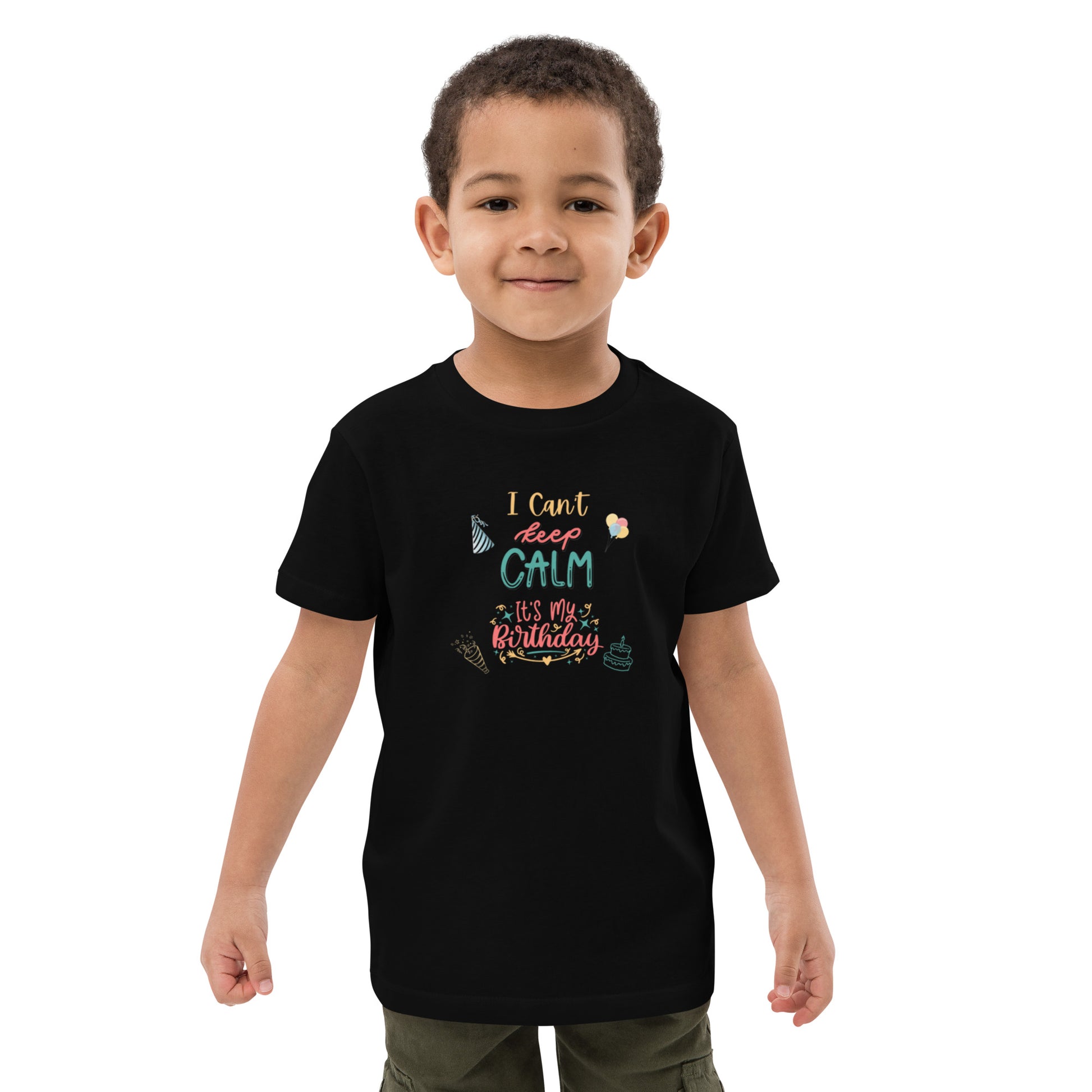 "A little boy wearing a black I Can't Keep Calm It's my Birthday Slogan T-Shirt."