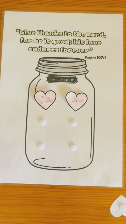 A video showing a Give Thanks To God gratitude jar activity for kids. 