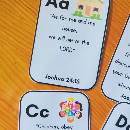 A video showing printed alphabet Bible verse cards. 