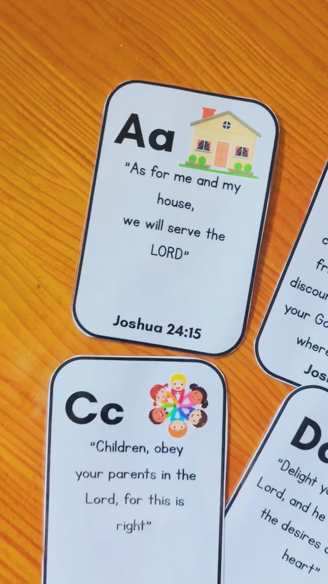 A video showing printed alphabet Bible verse cards. 
