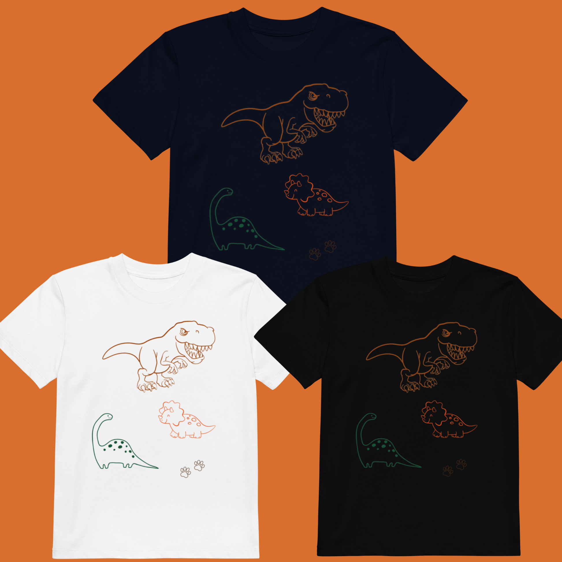 "Set of three kids dinosaur print shirts in black white and navy."